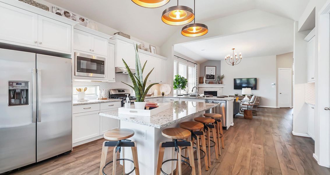 Representative furnished interior of a home built from the Oakley by Chesmar Homes in The Trails, New Caney (Image 7).