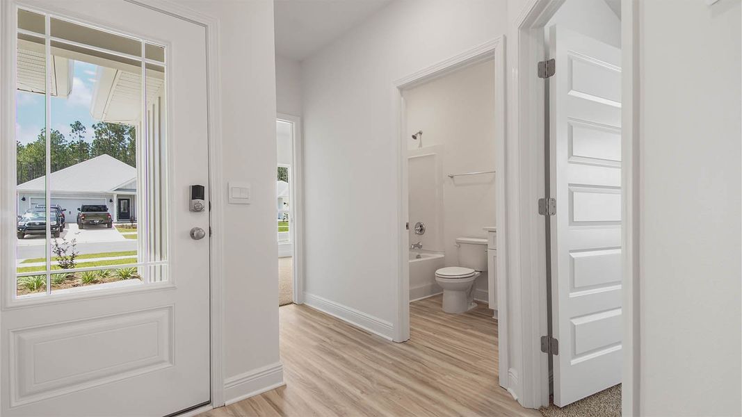 Representative furnished interior of a home built from the Kennedy by D.R. Horton in Bayside at Ward Creek, Panama City Beach (Image 17).