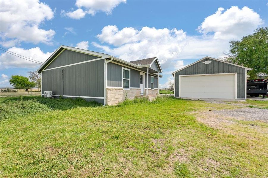 Exterior details and patio area of a home in , Joshua (Image 20).