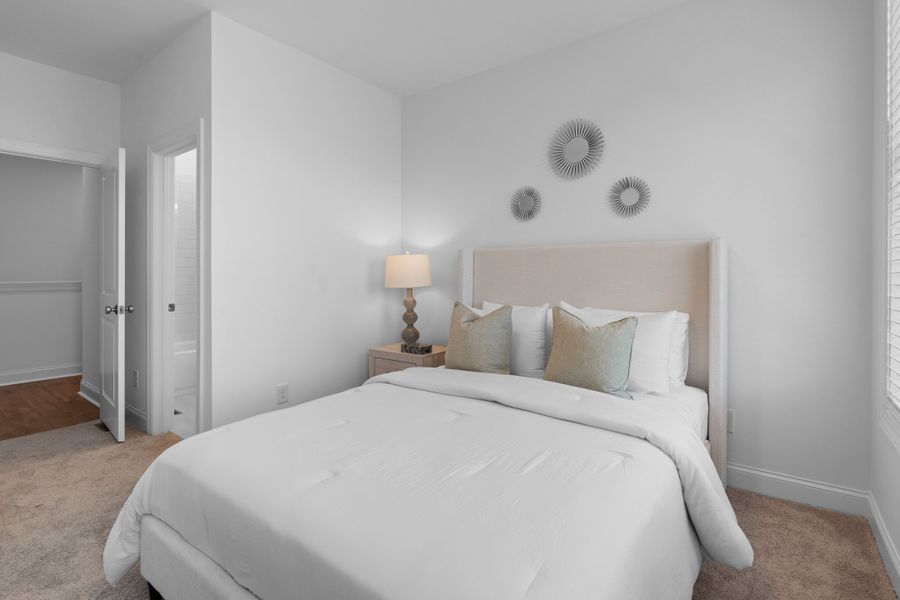 Representative furnished interior of a home built from the The Magnolia by The Providence Group in Market Square at Sawnee Village, Cumming (Image 29).