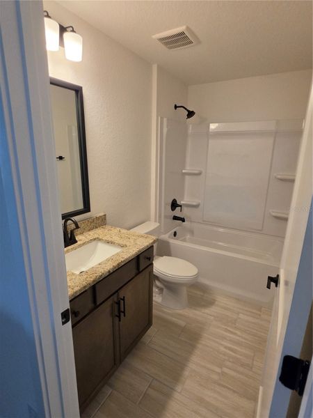 Furnished interior view inside a new home in Pine Bluff, Spring Hill (Image 9).