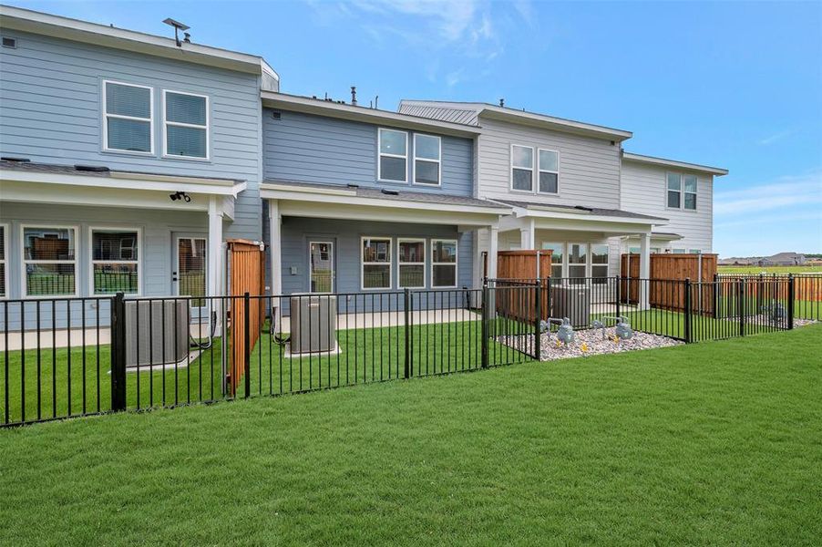 Exterior details and patio area of a home in Providence Commons, Providence Village (Image 3). Exterior details and patio area of a home in Providence Commons, Providence Village (Image 3).