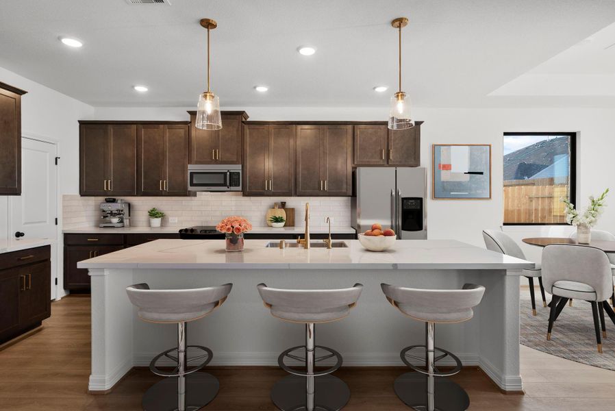 Open concept kitchen, living and dining.