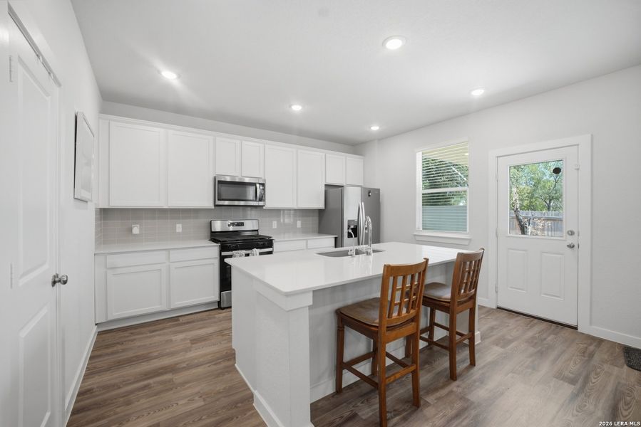 Furnished interior view inside a new home in Senna, San Antonio (Image 15).