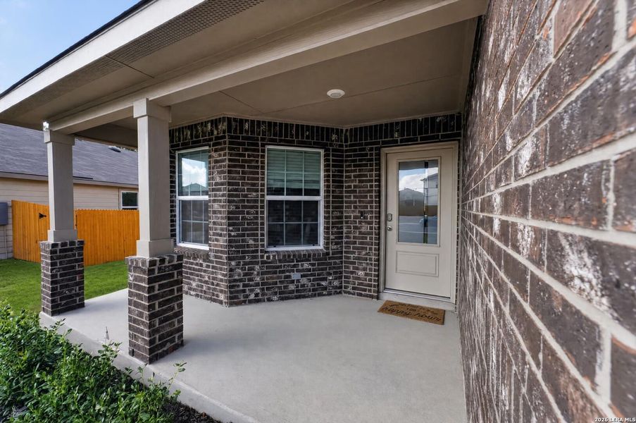 Exterior details and patio area of a home in Riverstone at Westpointe, San Antonio (Image 32).