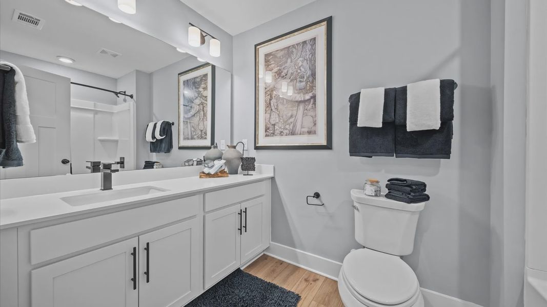 Spacious and modern bathroom with first-class vanity setup
