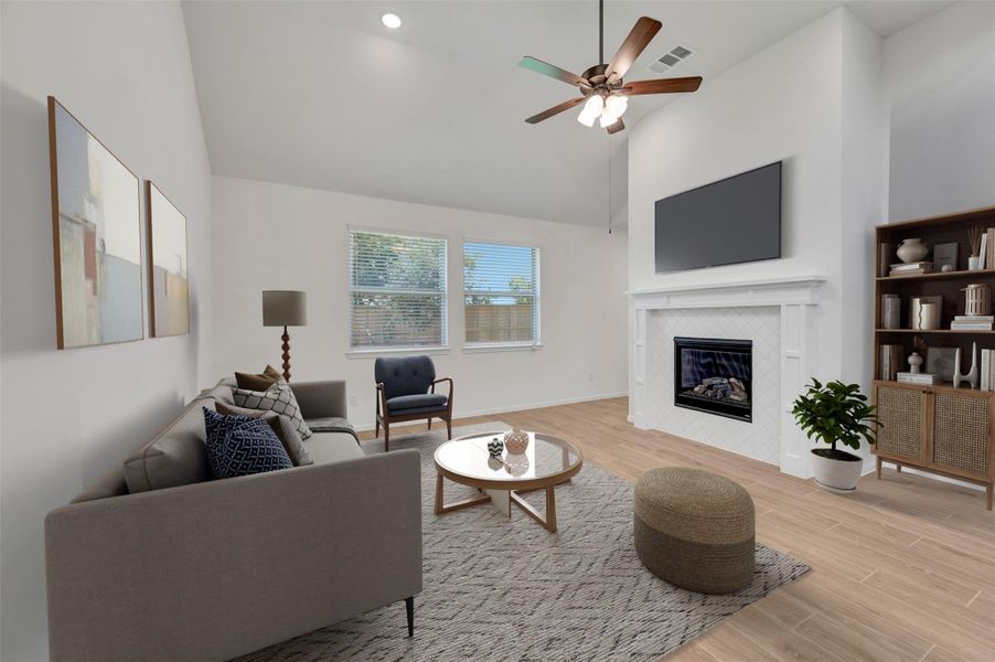 Open great room with a fireplace (*Photo not of actual home and used for illustration purposes only.)