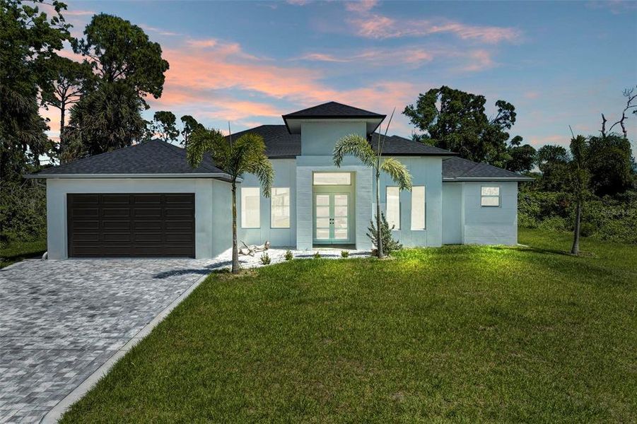 Front exterior of a new home in , North Port, FL, highlighting curb appeal (Image 24). Front exterior of a new home in , North Port, FL, highlighting curb appeal (Image 24).