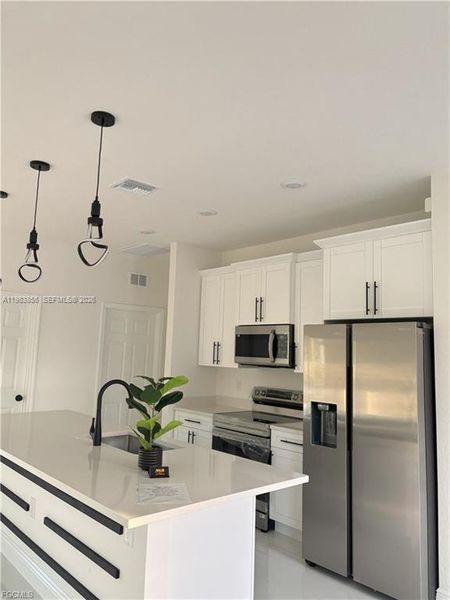 Furnished interior view inside a new home in , Lehigh Acres (Image 11).