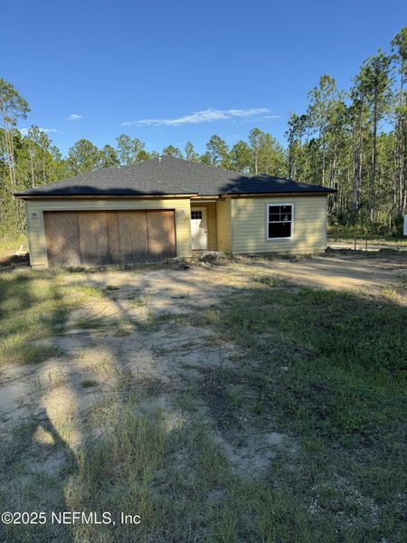 Exterior details and patio area of a home in , Hastings (Image 1).