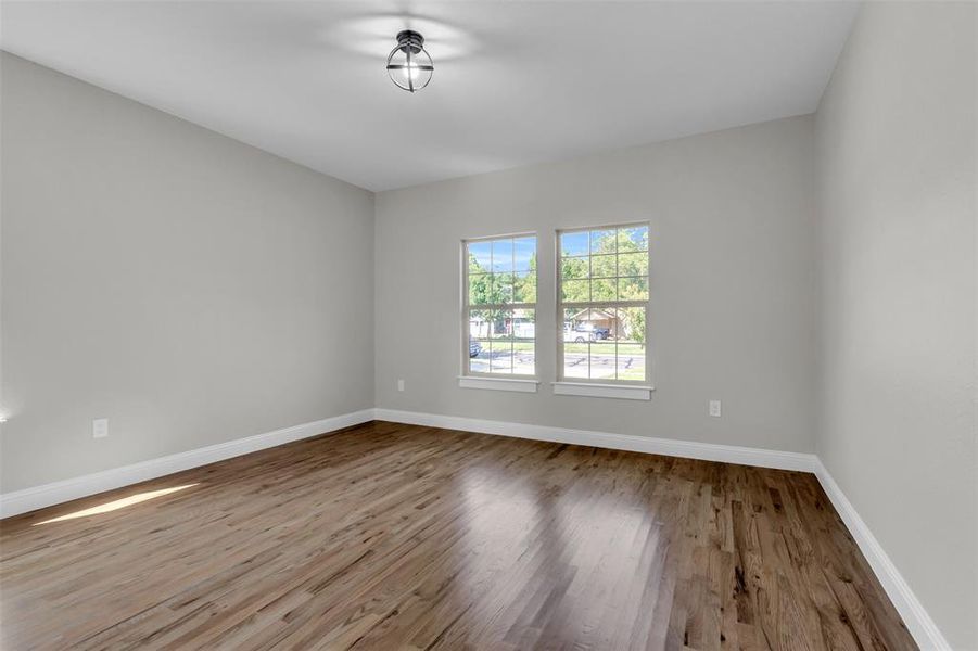 Empty room with light wood-style floors