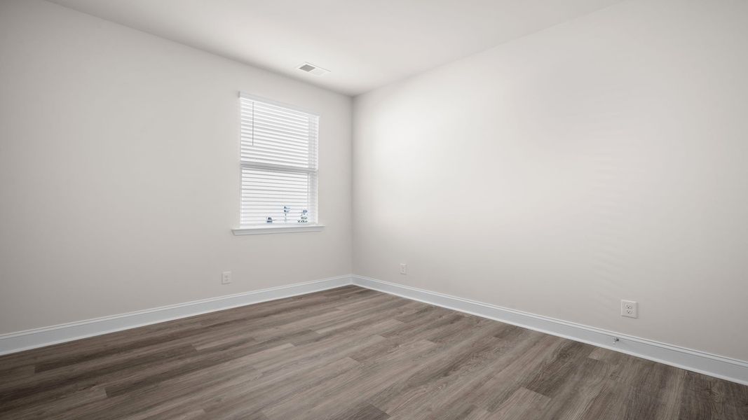 Spacious, unfurnished interior of a new home in The Groves at Bees Creek, Ridgeland (Image 21).