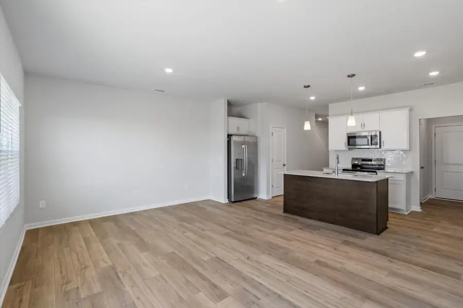 Spacious, unfurnished interior of a new home in West Main Townhomes, Sanford (Image 14).