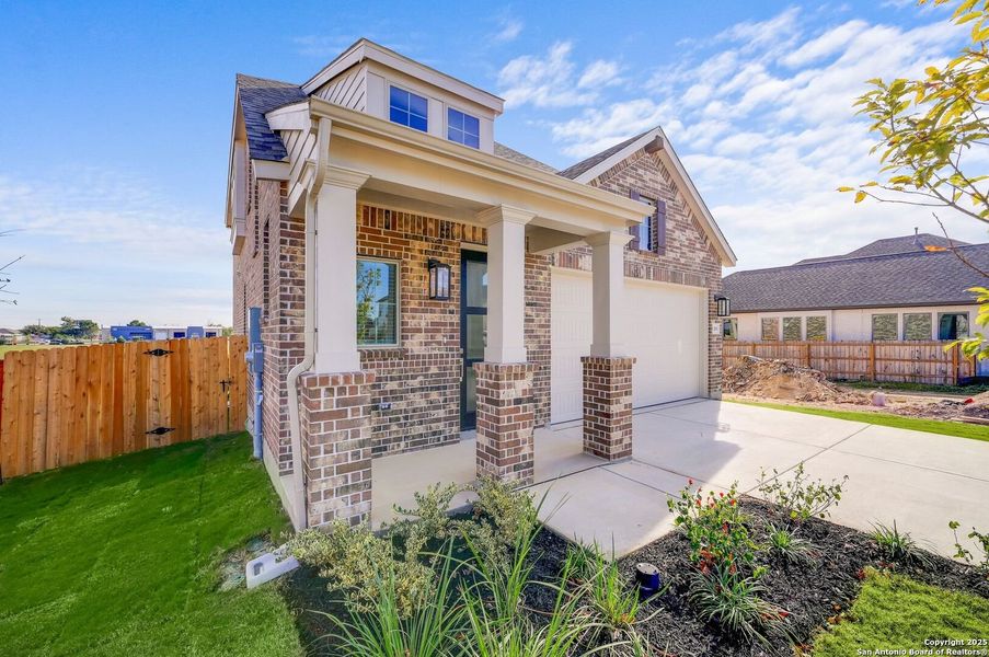 Exterior details and patio area of a home in Legacy at Lake Dunlap, New Braunfels (Image 4).