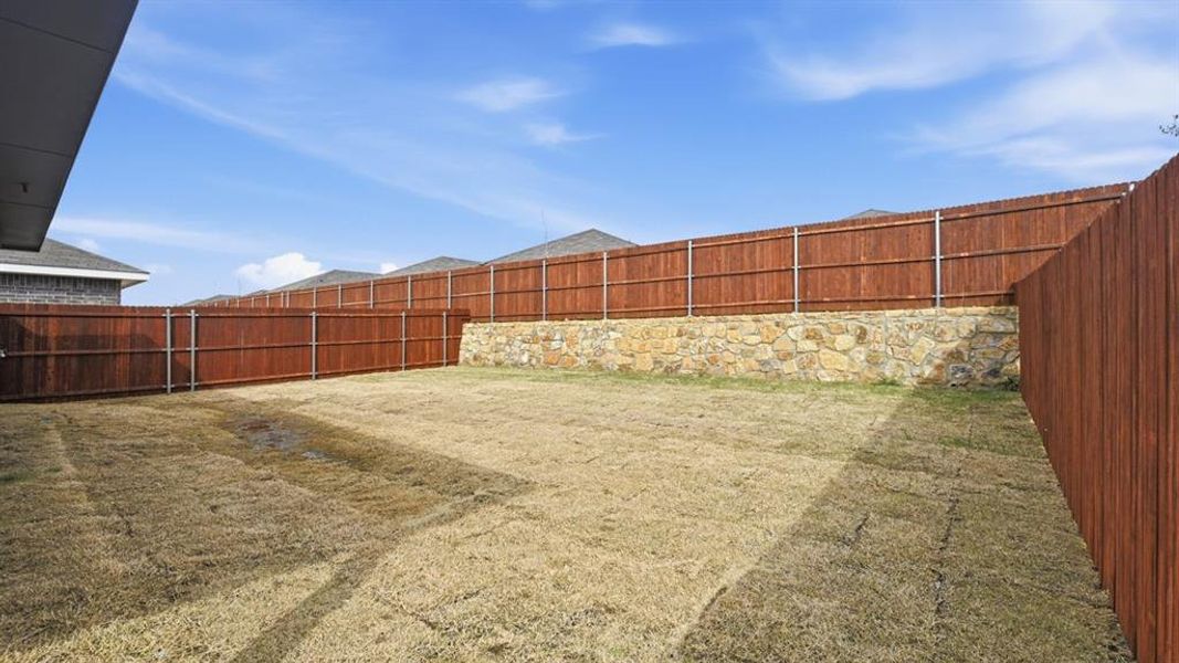 Backyard- All Home and community information, including pricing, included features, terms, availability and amenities, are subject to change at any time without notice or obligation. All Drawings, pictures, photographs, video, square footages, floor plans, elevations, features, colors and sizes are approximate for illustration purposes only and will vary from the homes as built.