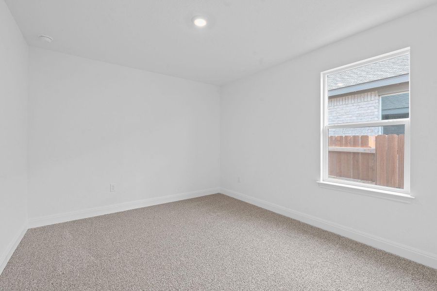 Spare room featuring carpet floors and recessed lighting Spare room featuring carpet floors and recessed lighting