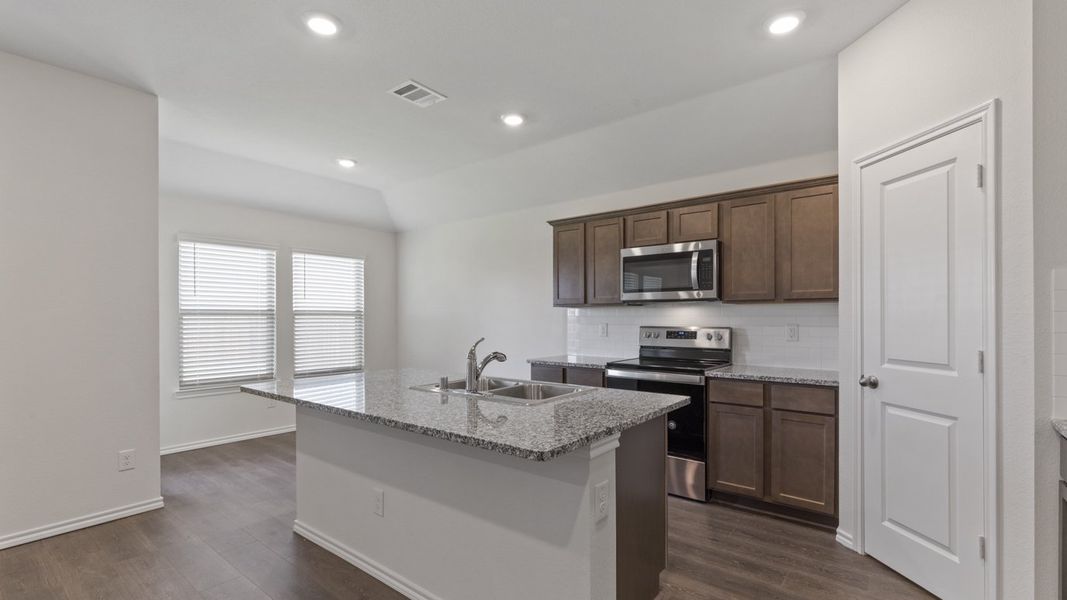 Furnished interior view inside a new home in Stonewyck Farms, Ennis (Image 6).