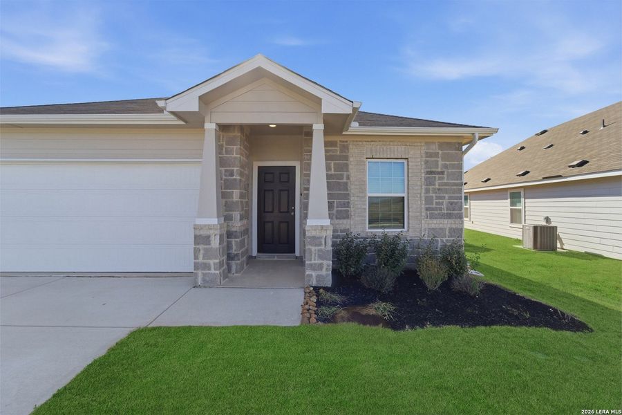 Front exterior of a new home in Cloud Country, New Braunfels, TX, highlighting curb appeal (Image 20).