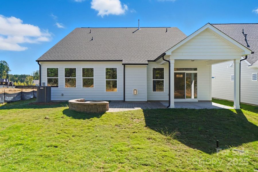 Exterior details and patio area of a home in Heritage - 55+ Community, Indian Trail (Image 18).
