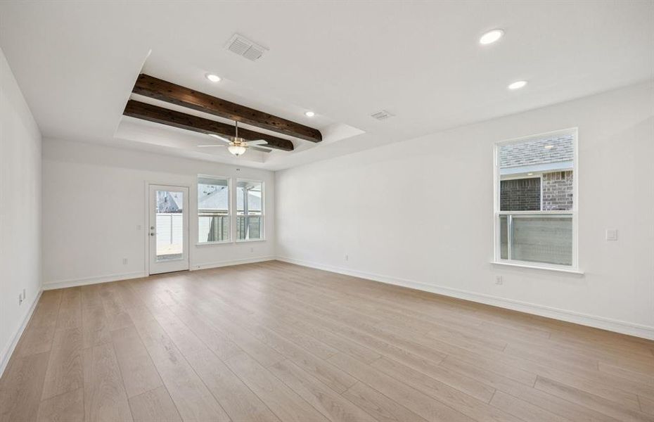 Gathering area with tray ceiling and beams Gathering area with tray ceiling and beams