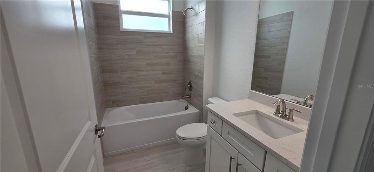 Furnished interior view inside a new home in Calusa Country Club, Lakewood Ranch (Image 5).