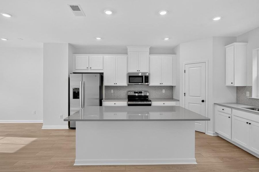 Furnished interior view inside a new home in Somerset at Veterans Memorial, Mableton (Image 15).