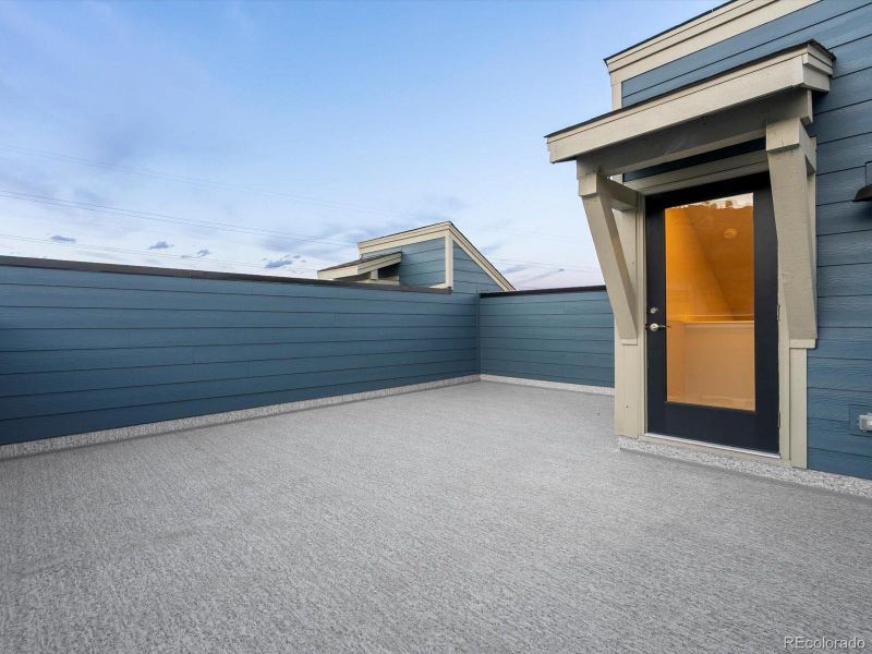 Exterior details and patio area of a home in Three Hills, Morrison (Image 3).