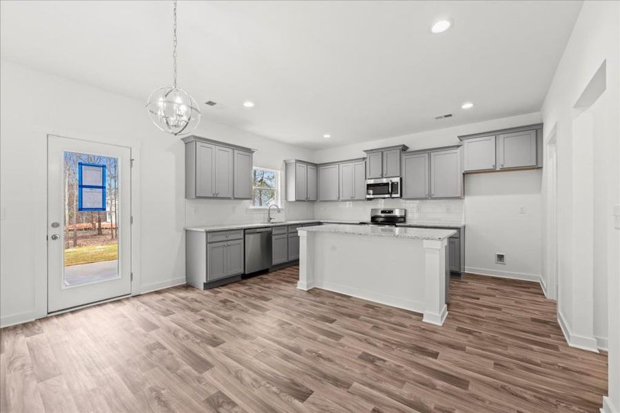 Furnished interior view inside a new home in , Statham (Image 9).