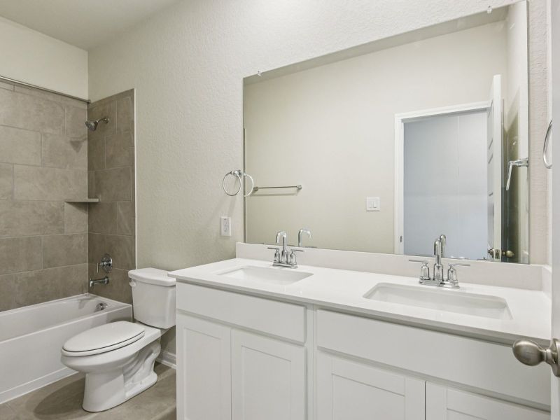 Guest bathroom in the Oleander floorplan at a Meritage Homes community.
