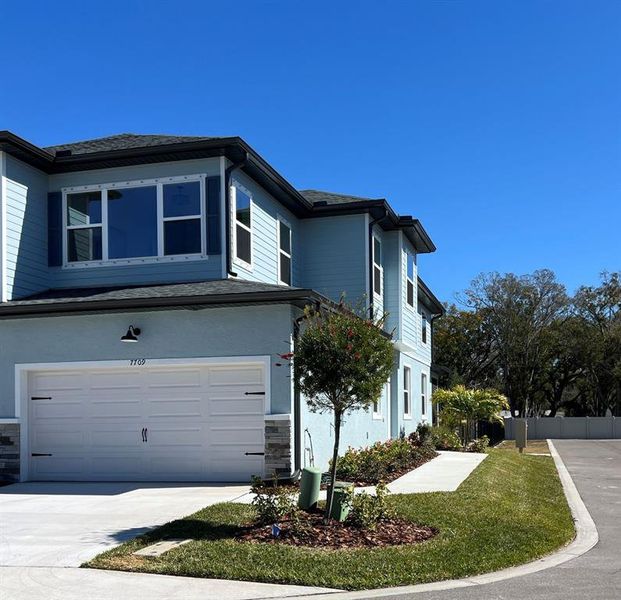 Front exterior of a new home in , Seminole, FL, highlighting curb appeal (Image 1). Front exterior of a new home in , Seminole, FL, highlighting curb appeal (Image 1).