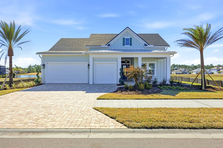 Front exterior of a new home in Amelia National Country Club, Fernandina Beach, FL, highlighting curb appeal (Image 22).