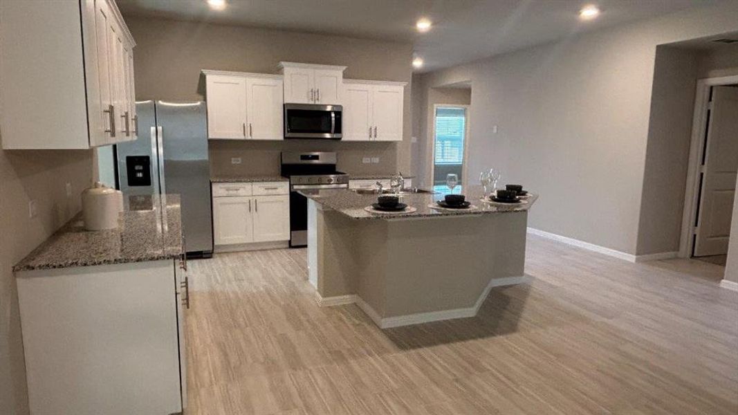 Kitchen - All Home and community information, including pricing, included features, terms, availability and amenities, are subject to change at any time without notice or obligation. All Drawings, pictures, photographs, video, square footages, floor plans, elevations, features, colors and sizes are approximate for illustration purposes only and will vary from the homes as built. Kitchen - All Home and community information, including pricing, included features, terms, availability and amenities, are subject to change at any time without notice or obligation. All Drawings, pictures, photographs, video, square footages, floor plans, elevations, features, colors and sizes are approximate for illustration purposes only and will vary from the homes as built.