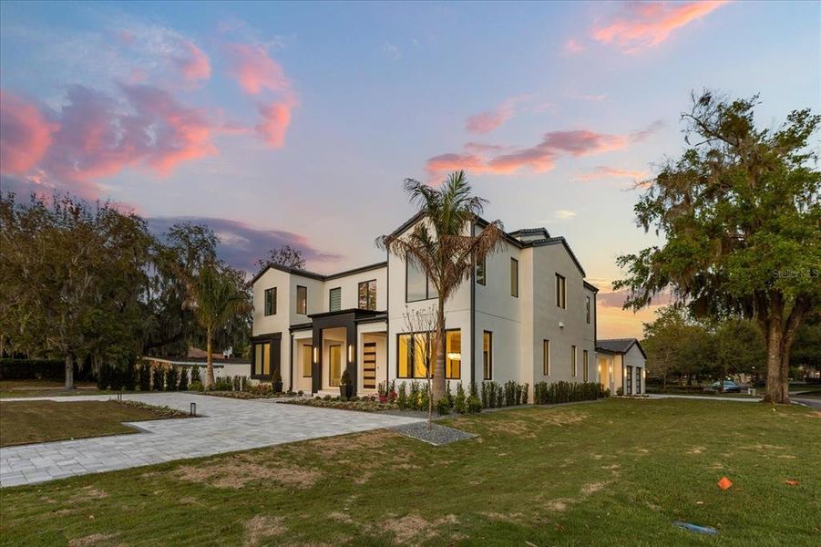 Front exterior of a new home in , Winter Park, FL, highlighting curb appeal (Image 35). Front exterior of a new home in , Winter Park, FL, highlighting curb appeal (Image 35).