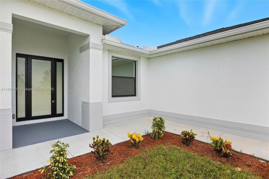 Exterior details and patio area of a home in , Cape Coral (Image 16). Exterior details and patio area of a home in , Cape Coral (Image 16).