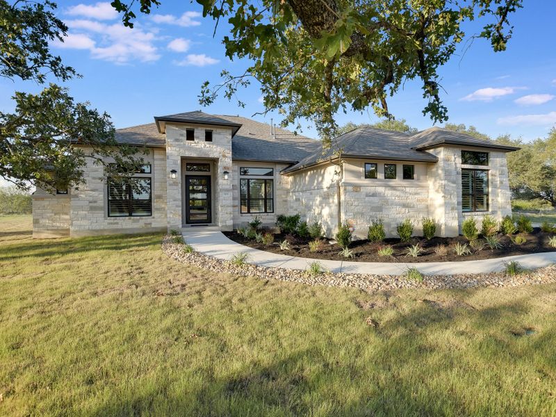Representative exterior photo of a completed home built from the San Simeon I by Giddens Homes in Clearwater Ranch, Liberty Hill, TX (Image 29).