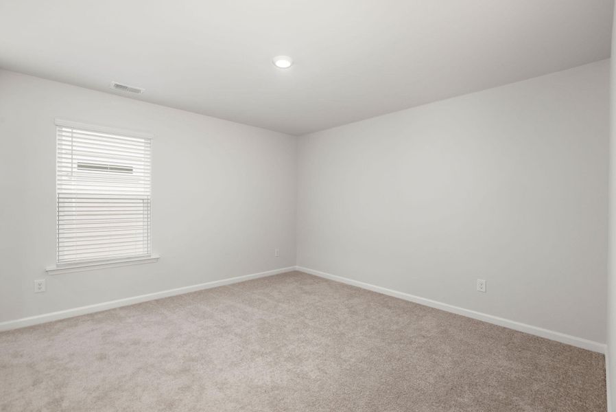Spacious, unfurnished interior of a new home in The Ponds, Summerville (Image 30).