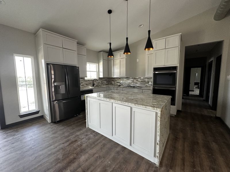 Construction in progress for homes built from the Zephyer 1 by Zeal Home Builders in Saddle Crest Estates, Weatherford, TX (Image 9).