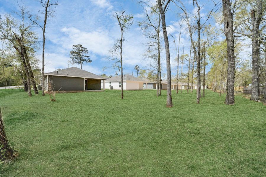 Front exterior of a new home in , Cleveland, TX, highlighting curb appeal (Image 14). Front exterior of a new home in , Cleveland, TX, highlighting curb appeal (Image 14).