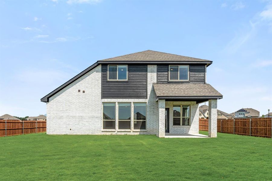 Front exterior of a new home in Homestead at Daniel Farms Phase 2, DeSoto, TX, highlighting curb appeal (Image 22). Front exterior of a new home in Homestead at Daniel Farms Phase 2, DeSoto, TX, highlighting curb appeal (Image 22).