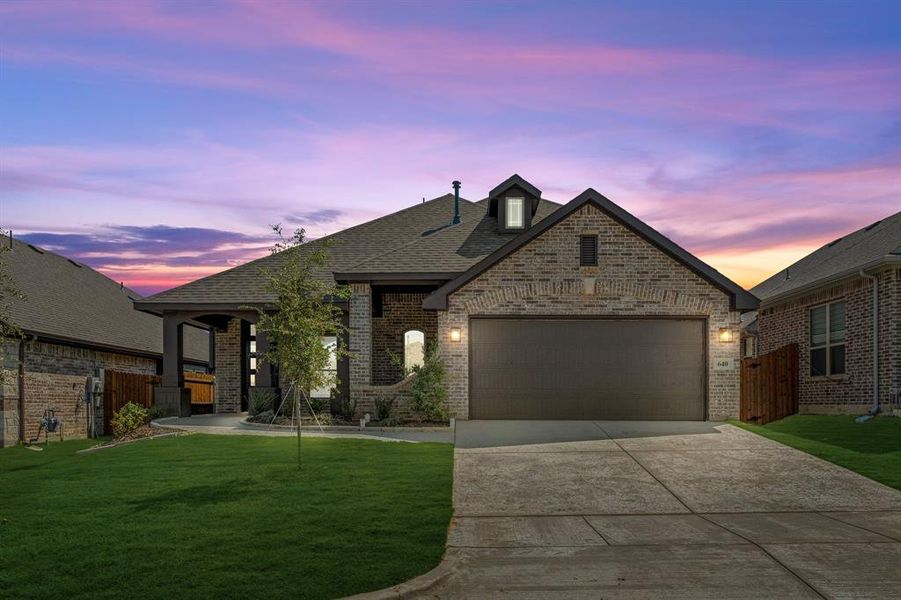 Front exterior of a new home in Godley Ranch Classic, Godley, TX, highlighting curb appeal (Image 24). Front exterior of a new home in Godley Ranch Classic, Godley, TX, highlighting curb appeal (Image 24).