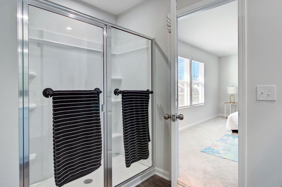 Furnished interior view inside a new home in Sanctuary Cove at Cane Bay, Summerville (Image 36).