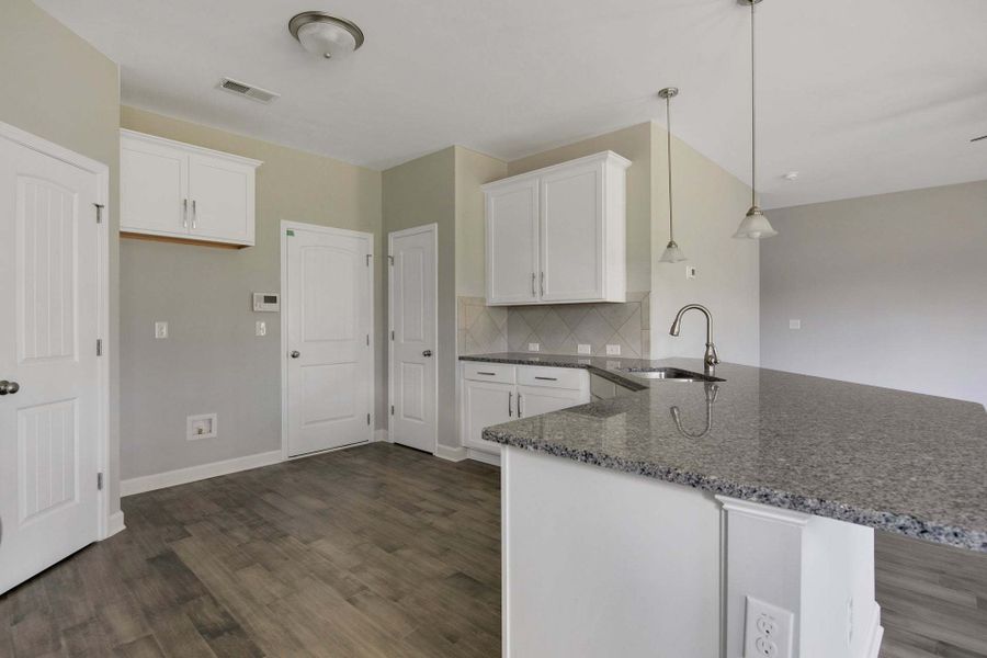 Representative furnished interior of a home built from the Springfield by Caviness & Cates Communities in Sutherland Station at Olde Liberty, Franklinton (Image 94). Representative furnished interior of a home built from the Springfield by Caviness & Cates Communities in Sutherland Station at Olde Liberty, Franklinton (Image 94).