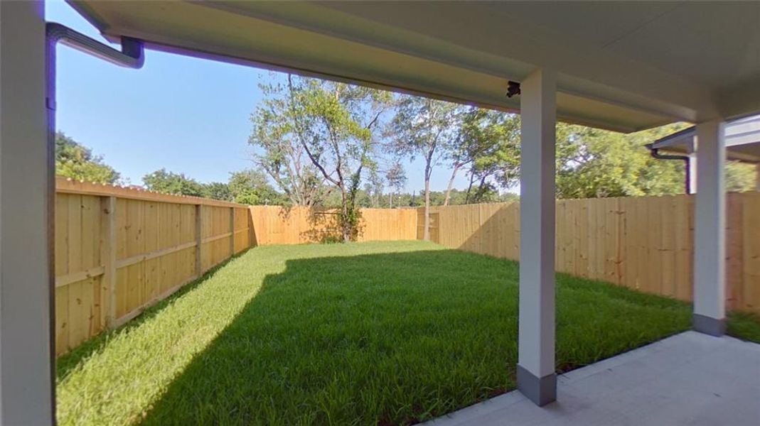 7918 James Franklin St patio that expands the full width of the home.