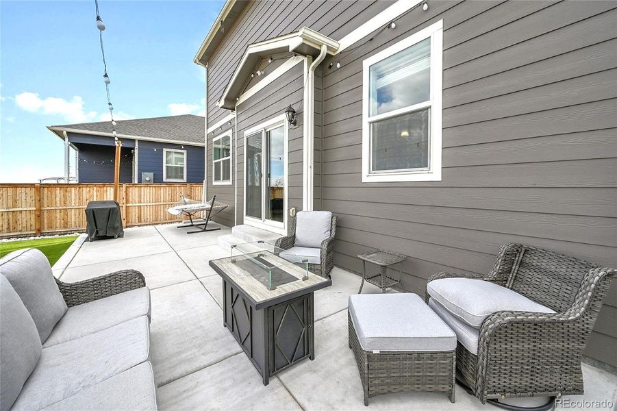 Exterior details and patio area of a home in Settlers Crossing, Commerce City (Image 22).