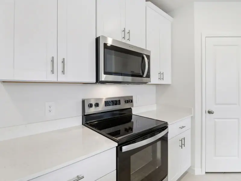 Furnished interior view inside a new home in The Reserve at Hammock Oaks Townes, Lady Lake (Image 4).
