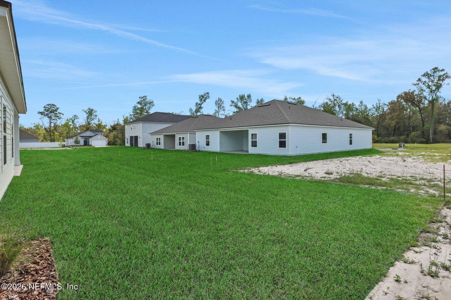 Exterior details and patio area of a home in Jennings Farm, Middleburg (Image 3).