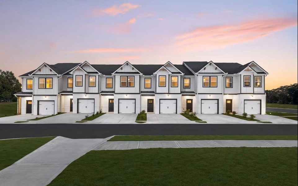 Front exterior of a new home in Carolina, Palmetto, GA, highlighting curb appeal (Image 1). Front exterior of a new home in Carolina, Palmetto, GA, highlighting curb appeal (Image 1).