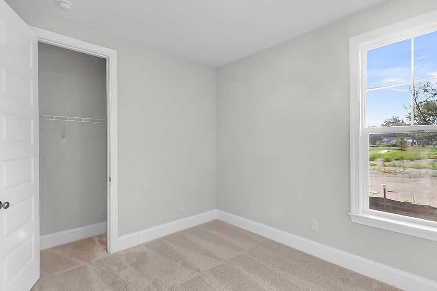 Spacious, unfurnished interior of a new home in Pineland Preserve, Summerville (Image 41).
