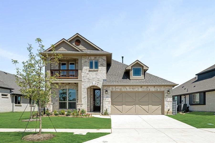Front exterior of a new home in Union Park Classic 55, Little Elm, TX, highlighting curb appeal (Image 2).