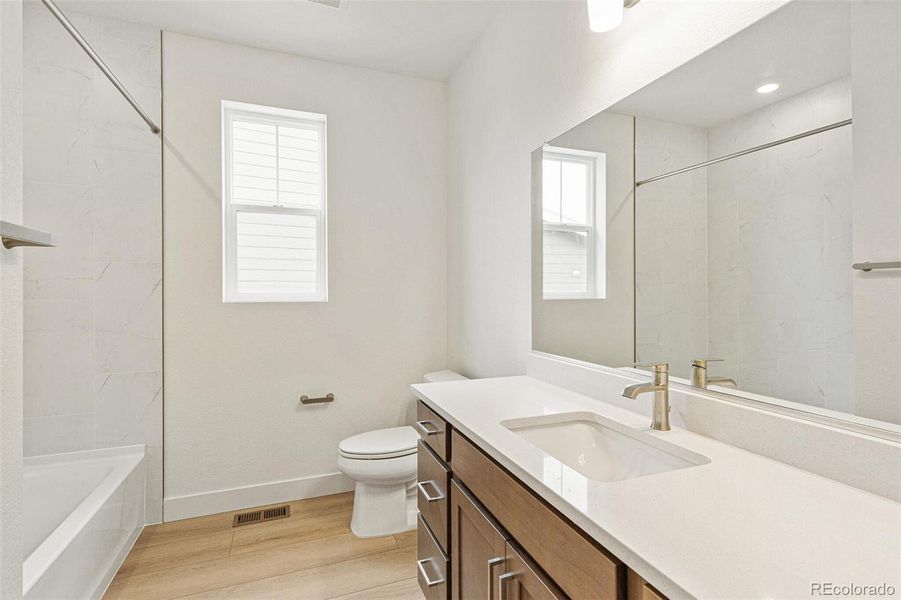 Furnished interior view inside a new home in Painted Prairie, Aurora (Image 5).